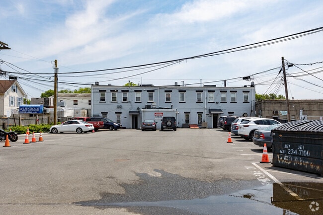 Rear Parking for Tenants - Amitville Flats