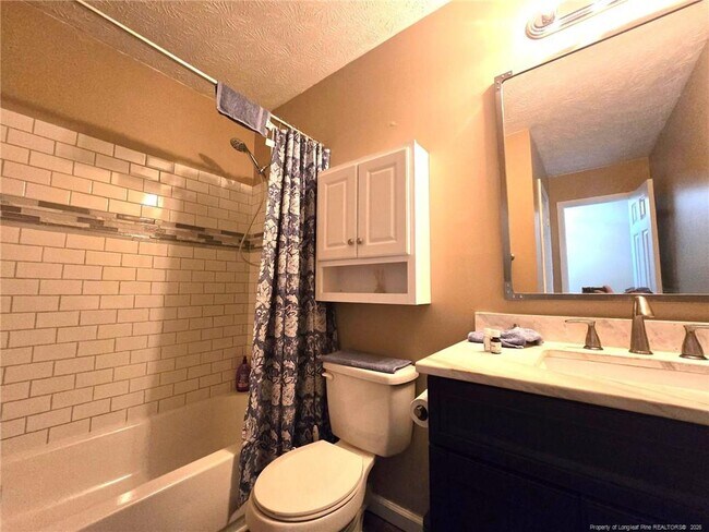 Building Photo - 6873 Brasswood Dr