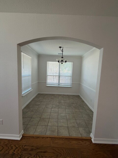 Building Photo - Former model home on corner lot is ready for move in!