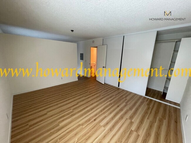 Building Photo - Bonus Den! Beautiful lower condo with large patio in Tara Hills, a resort style living complex!