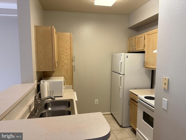 Building Photo - 1600 Spring Gate Dr.