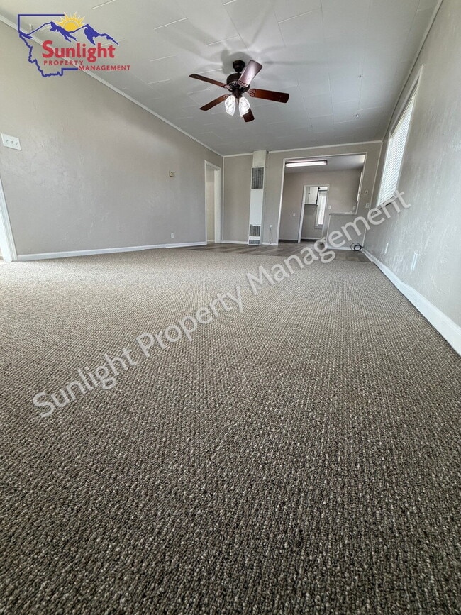 Building Photo - 2 Bed, 1 Bath Home with Detached Garage, Fenced Yard, and Built-In Storage