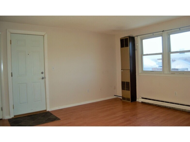 *Wall has been painted since photo was taken - 119 Main St