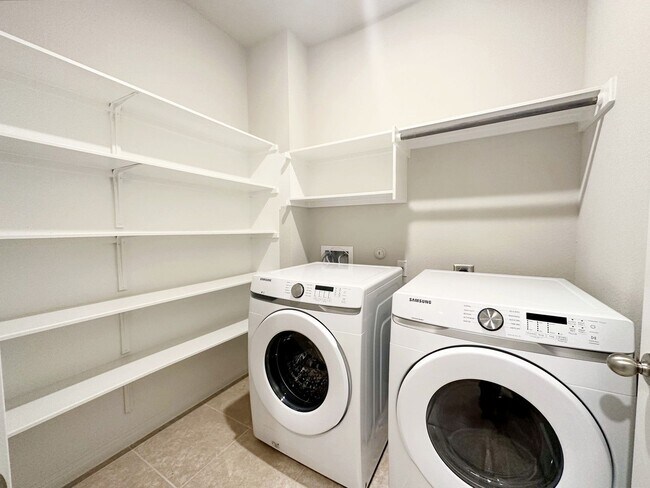 Building Photo - Bright & Roomy 5 Bedroom, 2.5 Bathroom Home with 2-Car Garage