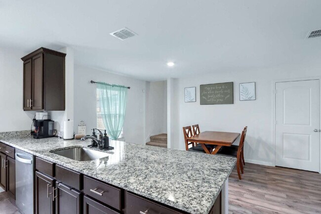 Building Photo - ASK ABOUT FREE APPLICATION FEES THROUGH AUGUST!  PRICE REDUCED!! Landscaping Included! Charming 3...