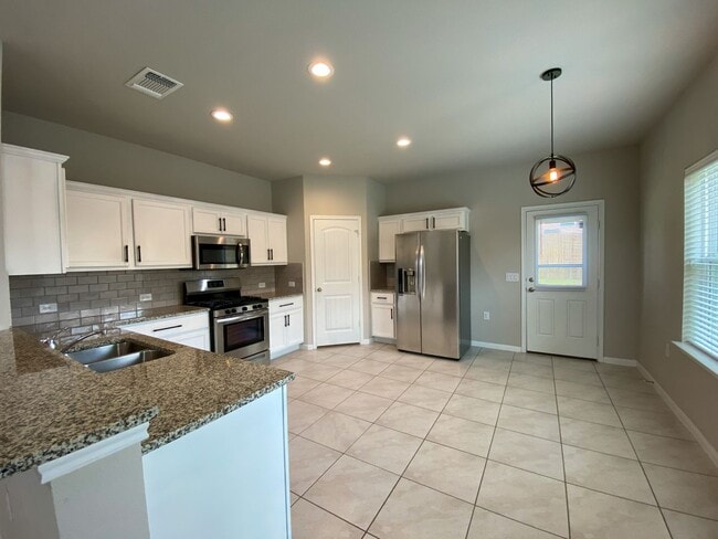 Building Photo - Stylish Southeast Austin Two-Story with Open Living, Modern Kitchen, and Flexible Spaces