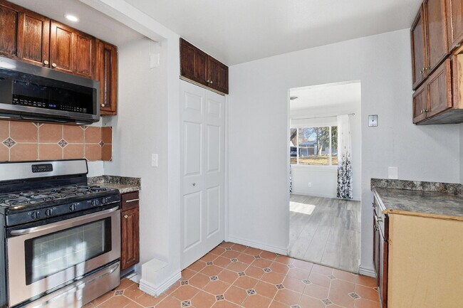 Building Photo - $1,930.95 - 3 Bedrooms, 1 Bathroom, Single Family Home in Aurora with fenced Yard!