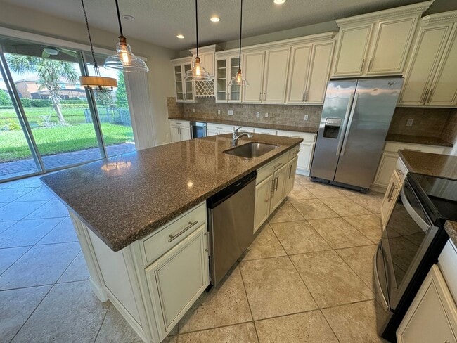 Building Photo - VillageWalk at Lake Nona ~ Gorgeous 4 bed/3 bath Executive Home!