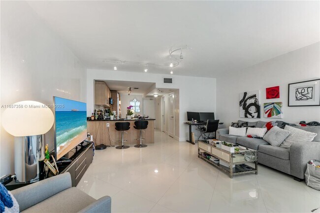 Building Photo - 10275 Collins Ave