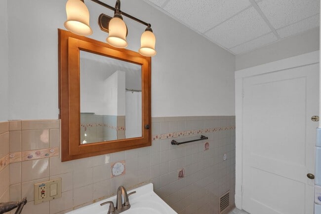 Building Photo - NORWOOD – Stunning Old-World Charm with Modern Comforts