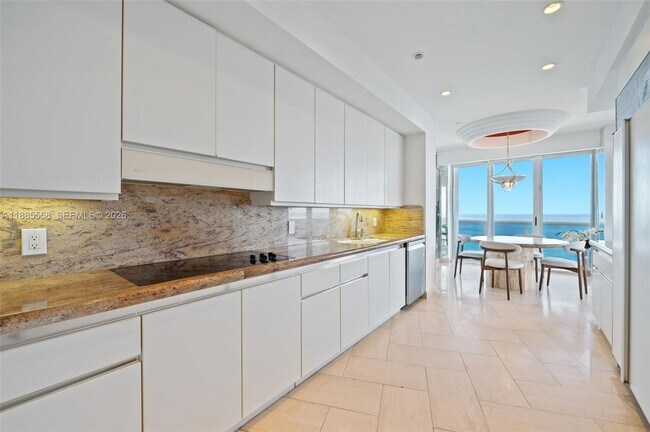 Building Photo - 9601 Collins Ave