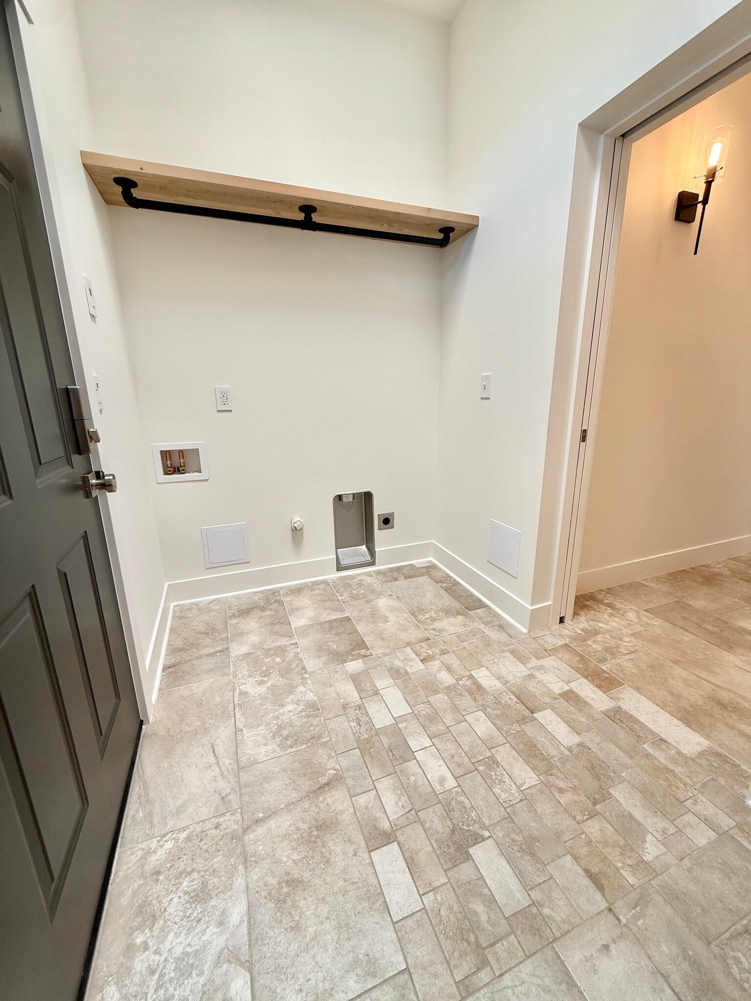 Washer and dryer hook ups, space for hanging clothes and storage - 24 Ash St N