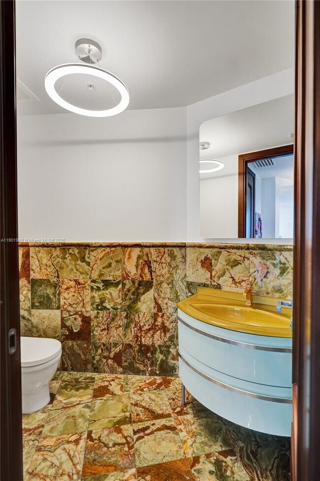 Building Photo - 18201 Collins Ave