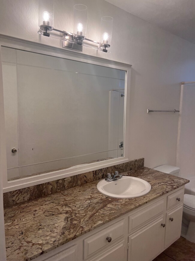 New granite and framed mirror - 2356 Canyon Park Dr