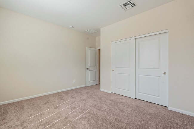 Building Photo - Beautiful New Spacious Home Includes 3 car...