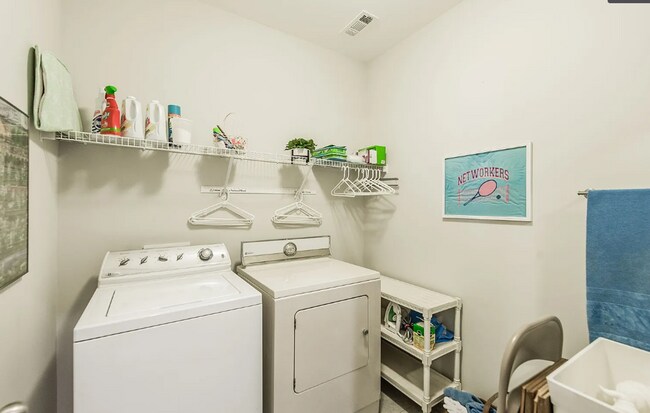 Building Photo - Upscale Modern Townhome nestled in the   G...