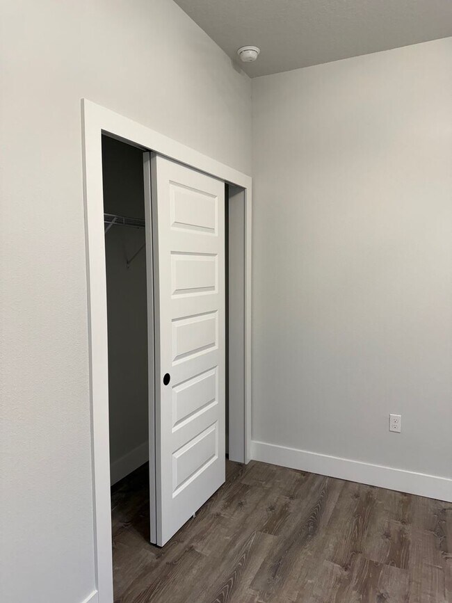 Building Photo - Brand new 3/2/2 with fenced in yard and a screened in porch!