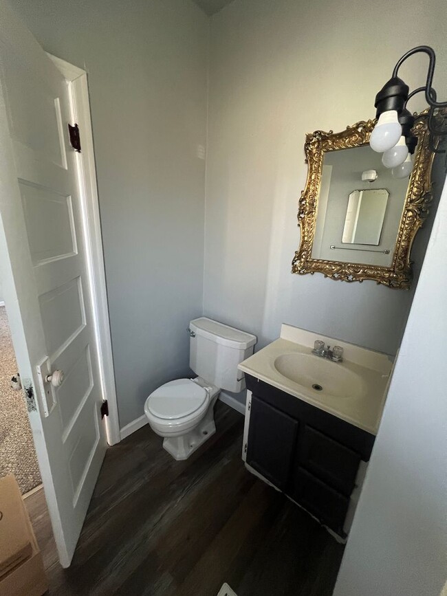 Building Photo - Spacious-Charming-Two Plus Bedrooms-Sunny Windows-Fenced Yard-Pet Family Members Welcome!