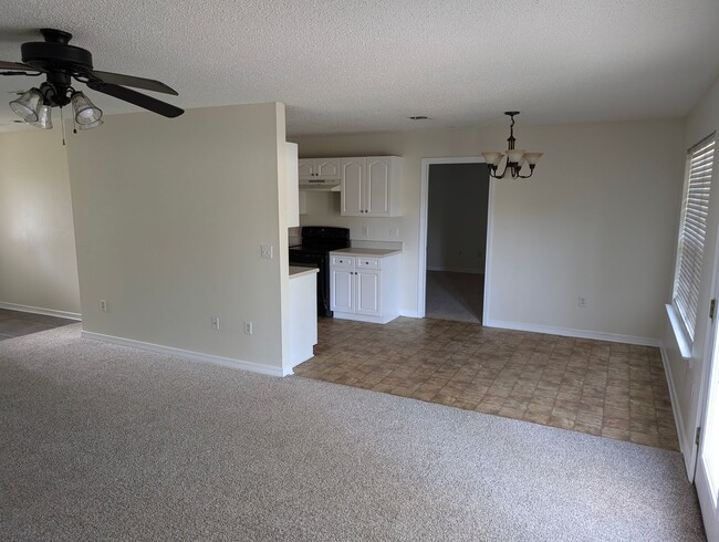 Building Photo - Updated 4-Bedroom Home on a Quiet Street — 1,695 sq ft, Large Garage — Now Accepting Applications