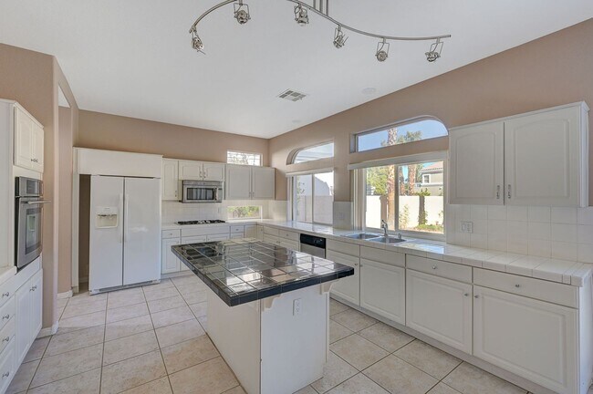 Building Photo - Stunning Green Valley home with a pool in guard gated Legacy