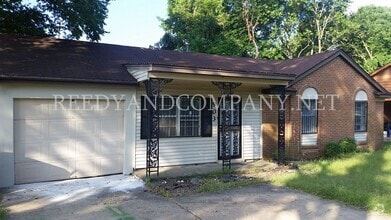 Building Photo - 903 W Raines Rd