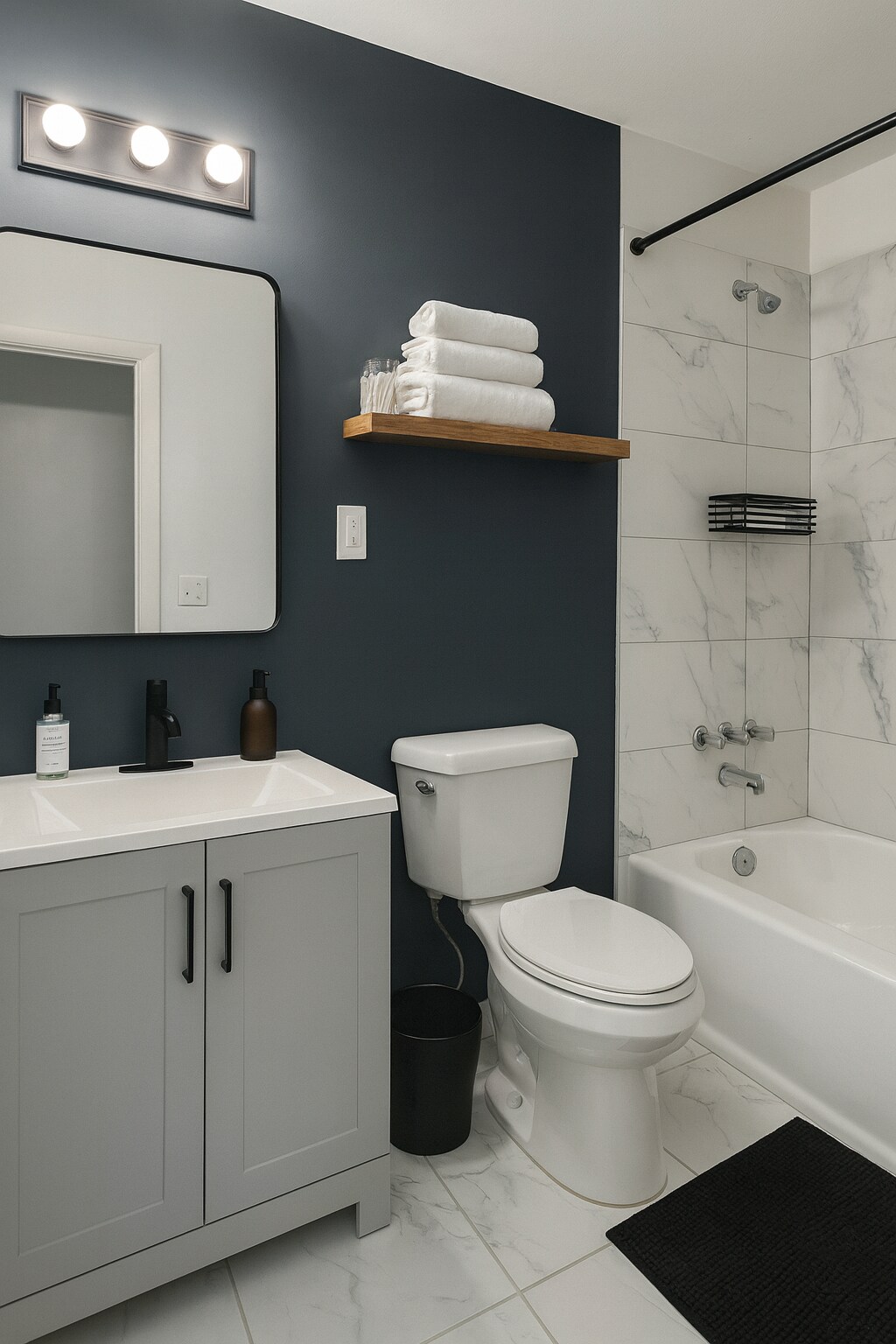 A clean, well-maintained shared bathroom with a tub/shower combo and fresh linens provided. - 2394 Bouldercliff Way SE