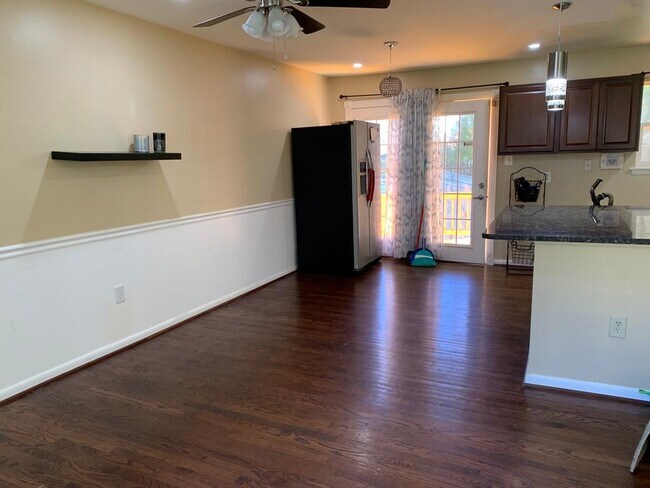 Living room and open kitchen - 5625 Saint Charles Dr