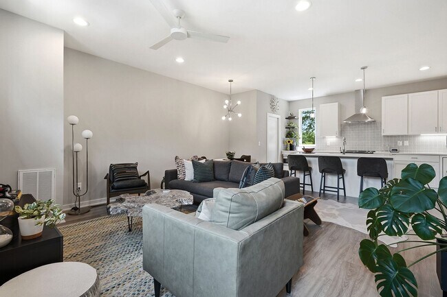 Building Photo - Live Elevated in Downtown Raleigh – Stunning Townhome with Rooftop Oasis!