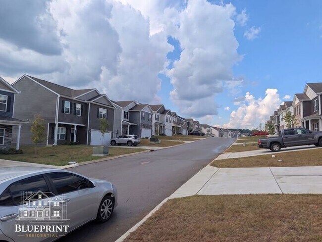 Building Photo - 2024 build, great neighborhood, stainless appliances, granite countertops!