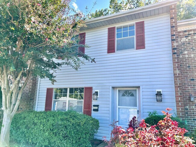Building Photo - Three-bedroom, two-and-a-half bathrooms in...