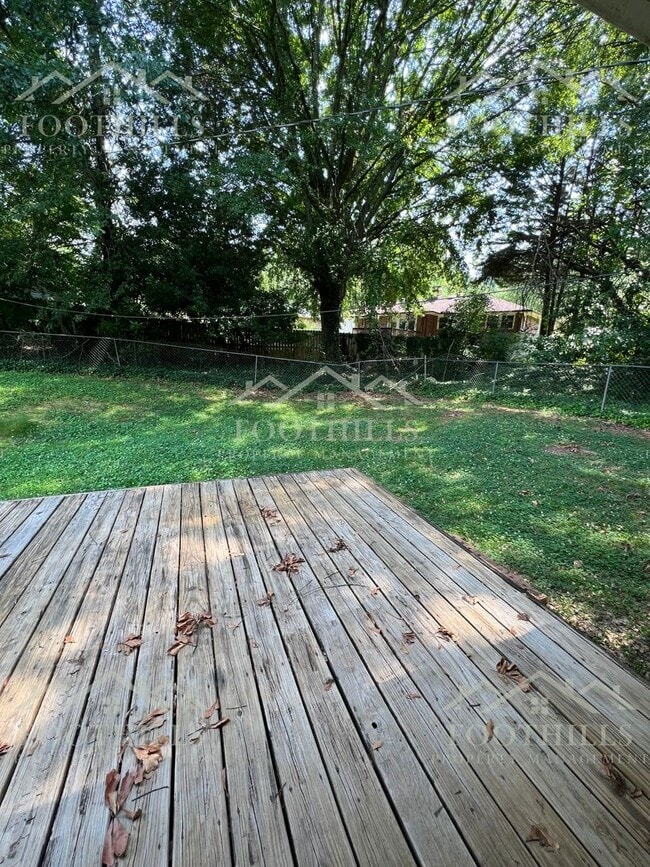 Building Photo - 3 Bedroom Home with Fenced Yard & Carport ...