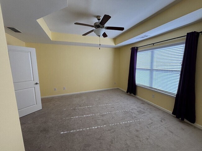 Building Photo - Gated Private Community! Spacious 3 Bedroom and 2.5 Bath End Unit Townhome