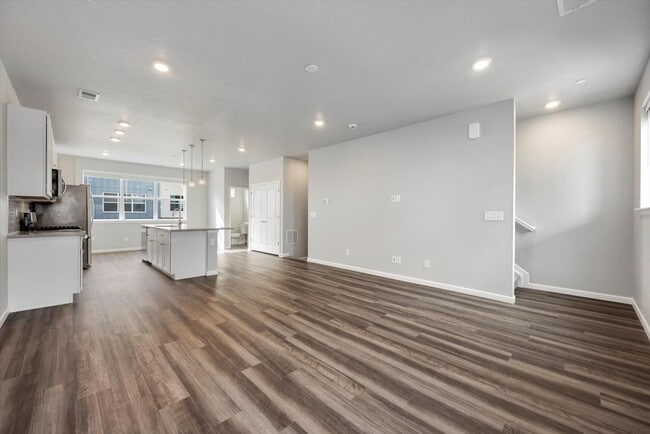 Building Photo - Gorgeous NEW Three Story Townhome with two car attached garage!