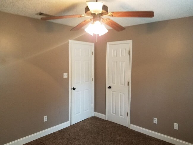 Building Photo - Spacious 3BR Brick Home with Open Split Floor Plan & Tiled Back Porch on Nearly an Acre