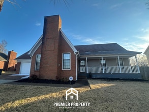 Building Photo - Spacious 4BR Cordova Home w/ Brick Fireplace, 2 Dining Areas & Covered Patio