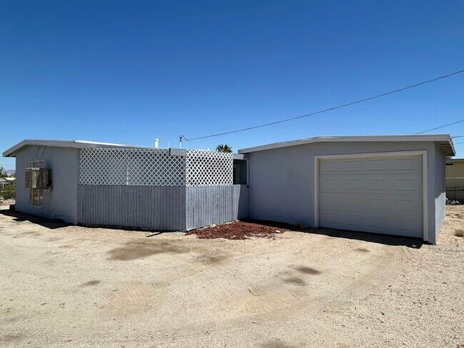 Building Photo - 74975 Serrano Dr