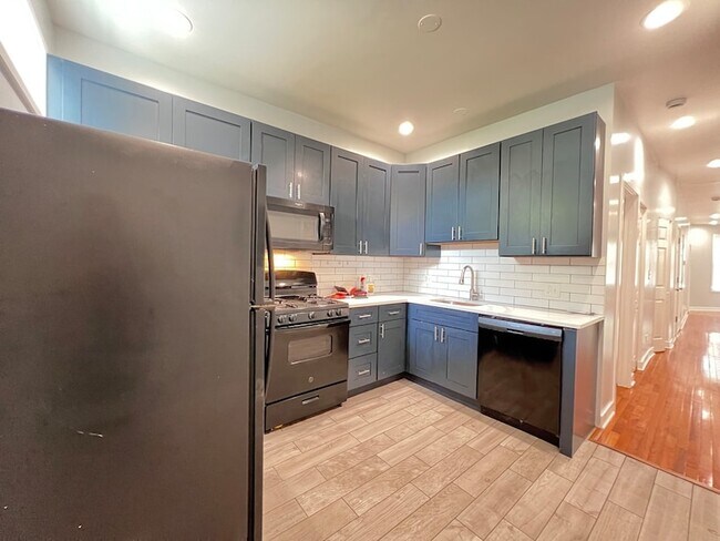 Building Photo - 6402 S Eberhart Ave