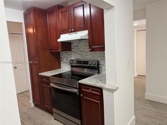 Building Photo - 2700 Coral Springs Dr