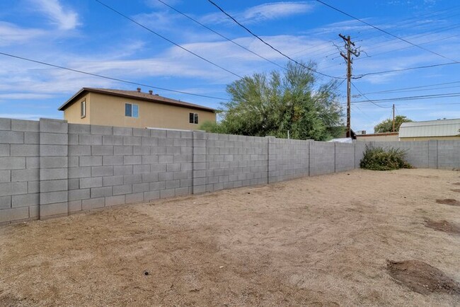 Building Photo - NEW Everything W/ Large Private Fenced yard