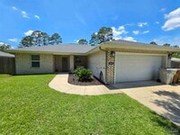 Building Photo - 5565 Riviera Dr