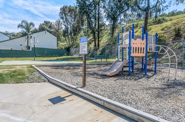 Building Photo - ***MOVE IN SPECIAL*** Modern 3BR Townhome | Garage + Driveway Parking | Yard | Pool | Pet Friendl...