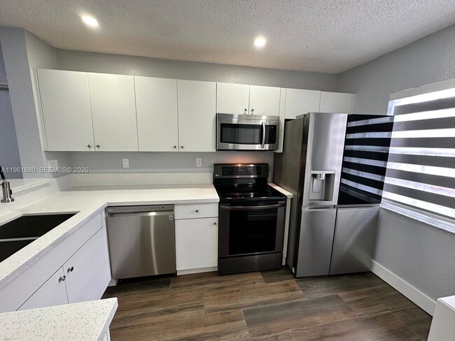 Building Photo - 14307 SW 120th Ct