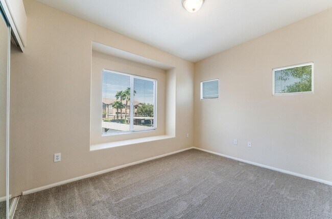 Building Photo - Upgraded condo in gated community