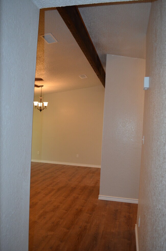 Building Photo - This 3 Bedroom Home with Fireplace is a must see!