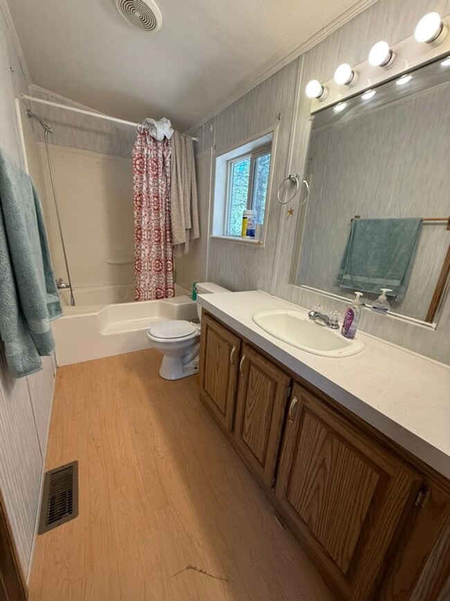 Building Photo - Peaceful 2-Bedroom with Den Home on Over an Acre with Private River Trail 3 Bedrooms | 2 Bathroom...