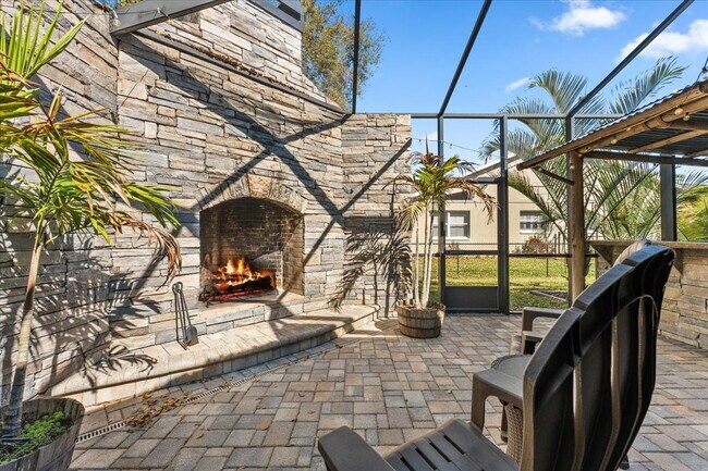 Building Photo - A vibrant 2-bedroom, 2-bathroom tropical retreat designed for both high-energy entertaining and l...