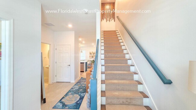 Building Photo - EXCEPTIONAL AND SPACIOUS FURNISHED TOWNHOME WITHIN WATERSIDE- NAUTIQUE!