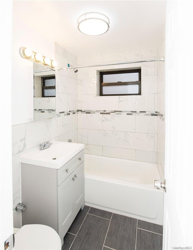 Building Photo - 94-30-94-60 60th Ave