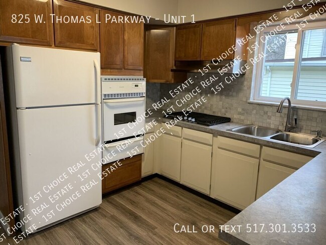 Building Photo - Spacious 3-BDR 1-BTH Apt w/ Garage & Laund...