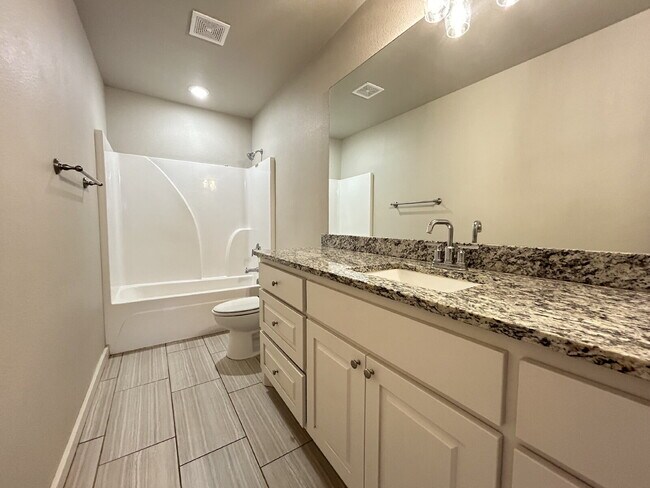 Building Photo - Stunning Duplex in Shallowater!